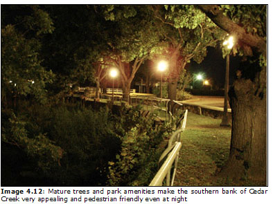 Image 4.12: Mature trees and park amenities make the southern bank of Cedar Creek very appealing and pedestrian friendly even at night